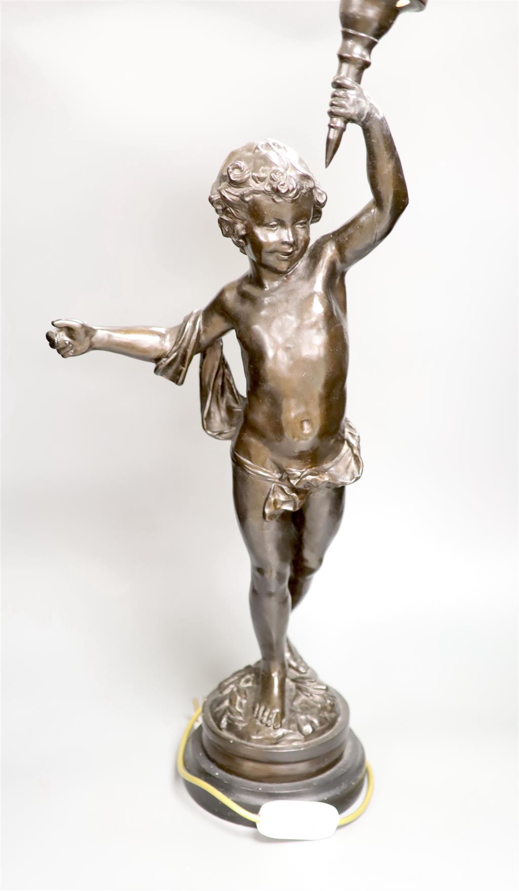 A spelter cherub lamp with flame shade, height 89cm